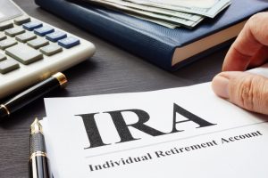 documents about Individual retirement account IRA on a desk